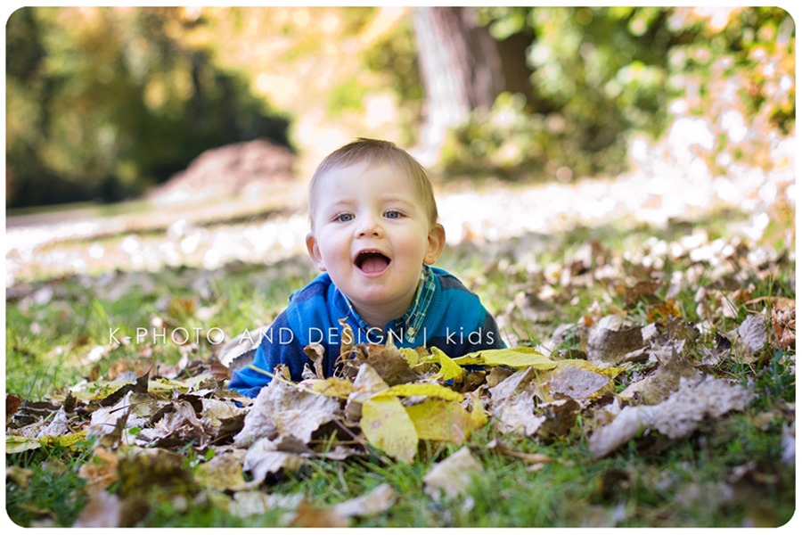 boy in leaves